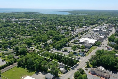This .81 acre property zoned HC= Hamlet commercial sits on the - photo 2
