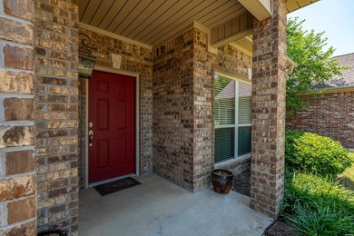 Welcome home to easy living in this beautifully maintained brick - photo 3
