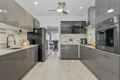 Privately located on a quiet cul-de-sac, this beautifully