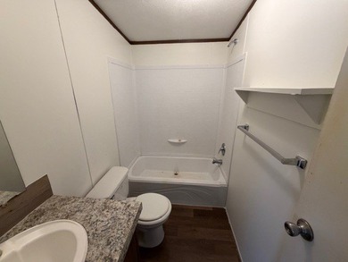 This well-maintained 2023 3-bedroom, 2-bath home offers the - photo 3