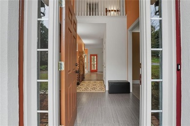 Privately located on a quiet cul-de-sac, this beautifully