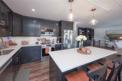 Enjoy maintenance-free lake living in this top level, penthouse - photo 7