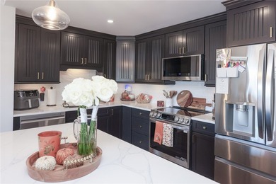Enjoy maintenance-free lake living in this top level, penthouse - photo 8