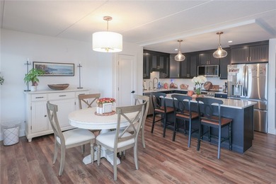 Enjoy maintenance-free lake living in this top level, penthouse - photo 10