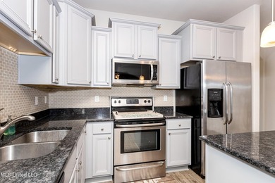 Welcome home to this charming 3-bedroom, 2-bath home in one of - photo 17