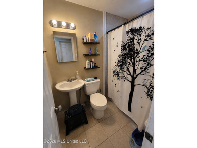 Welcome to this 3-bedroom, 1.5-bath home in Biloxi. Conveniently - photo 6