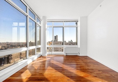 This bright and spacious 2-bedroom, 2-bathroom residence in the - photo 2
