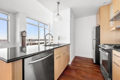 This bright and spacious 2-bedroom, 2-bathroom residence in the - photo 7