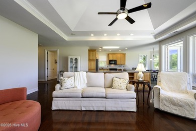 Sunlight pours through oversized windows, casting peaceful water - photo 16