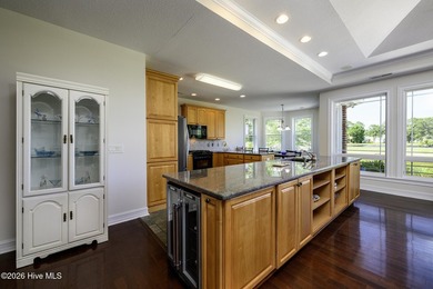 Sunlight pours through oversized windows, casting peaceful water - photo 17