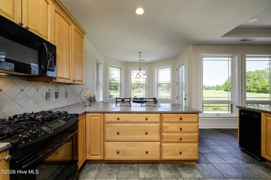 Sunlight pours through oversized windows, casting peaceful water - photo 20