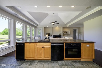 Sunlight pours through oversized windows, casting peaceful water - photo 24