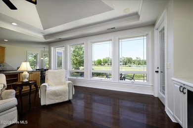 Sunlight pours through oversized windows, casting peaceful water - photo 25