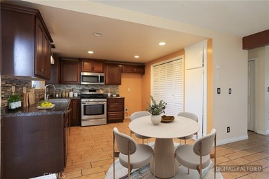 Welcome to Midtown Village! This 3-bedroom, 1.5-bath PUD offers - photo 6