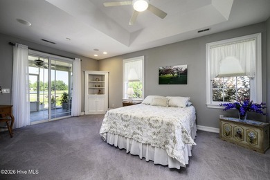 Sunlight pours through oversized windows, casting peaceful water - photo 31