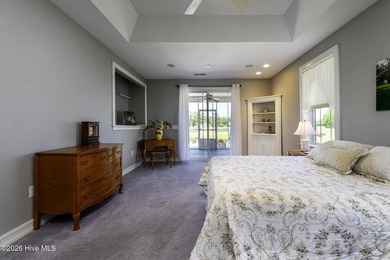 Sunlight pours through oversized windows, casting peaceful water - photo 32
