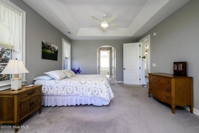 Sunlight pours through oversized windows, casting peaceful water - photo 34