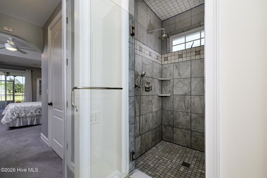 Sunlight pours through oversized windows, casting peaceful water - photo 39