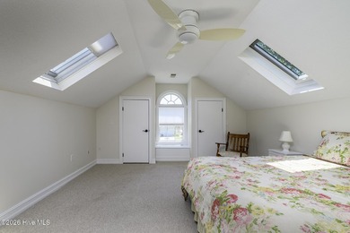 Sunlight pours through oversized windows, casting peaceful water - photo 44
