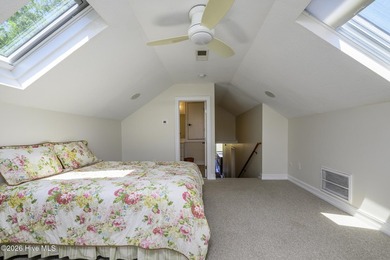 Sunlight pours through oversized windows, casting peaceful water - photo 45