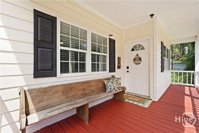 Nestled on nearly half an acre just moments from the heart of - photo 3