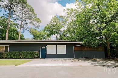 Welcome to 303 Lafayette Circle, a sprawling single-story ranch - photo 3