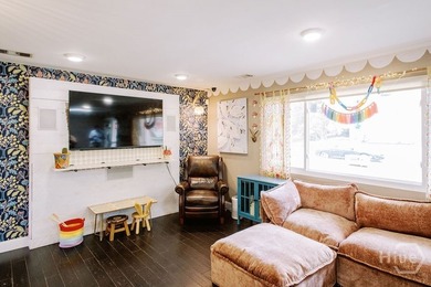 Welcome to 303 Lafayette Circle, a sprawling single-story ranch - photo 8