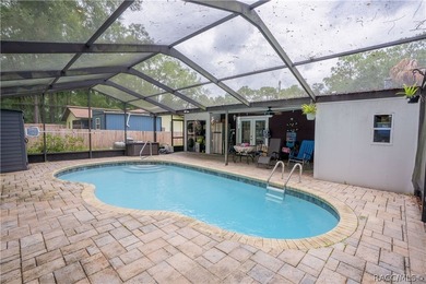 Beautifully maintained 4-bedroom, 2-bath pool home in the - photo 2