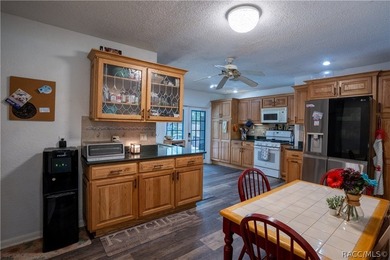 Beautifully maintained 4-bedroom, 2-bath pool home in the - photo 9
