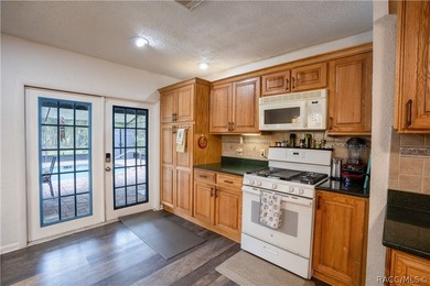 Beautifully maintained 4-bedroom, 2-bath pool home in the - photo 10