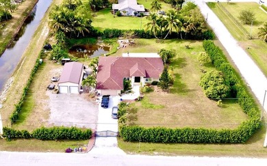 (private lake, pond, coastal) Home For Sale in The Acreage Florida