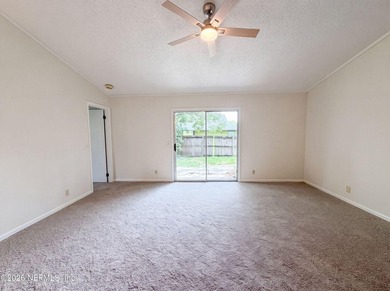 6320 Ian Chad Dr E is a 1-story Jacksonville brick home. The - photo 3