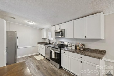 Experience the allure of lake life with 128 feet of Lake Front - photo 13
