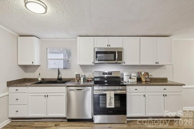 Experience the allure of lake life with 128 feet of Lake Front - photo 14
