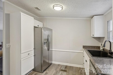 Experience the allure of lake life with 128 feet of Lake Front - photo 15