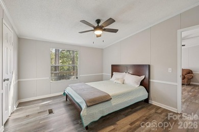 Experience the allure of lake life with 128 feet of Lake Front - photo 17