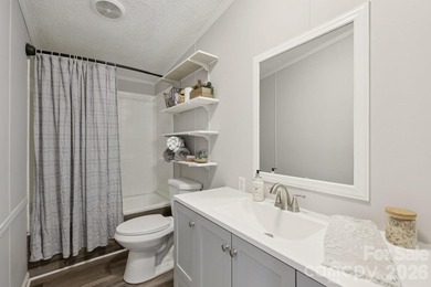 Experience the allure of lake life with 128 feet of Lake Front - photo 25