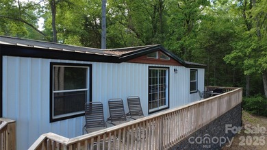 Experience the allure of lake life with 128 feet of Lake Front - photo 28
