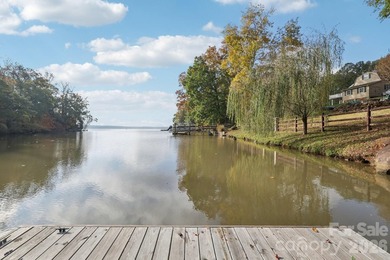Experience the allure of lake life with 128 feet of Lake Front - photo 32