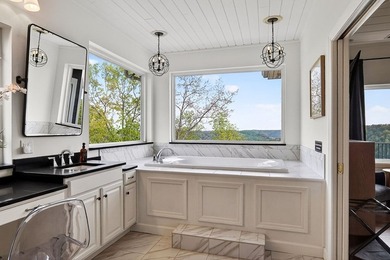 Framed by sweeping, unobstructed views of Center Hill Lake, this - photo 50