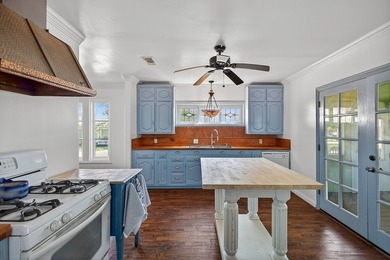 Discover this beautifully reimagined cottage in the heart of - photo 10