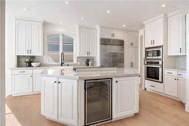 Overlooking the channel entrance, this waterfront home is - photo 7