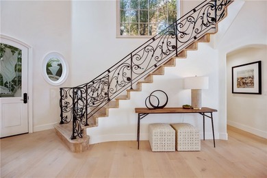 Overlooking the channel entrance, this waterfront home is - photo 8
