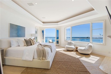 Overlooking the channel entrance, this waterfront home is - photo 9