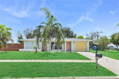 Mid-century modern charm abounds in this CBS home that features - photo 1