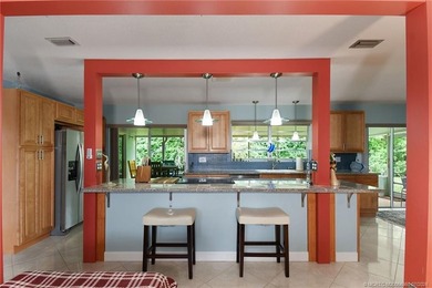 Mid-century modern charm abounds in this CBS home that features - photo 7