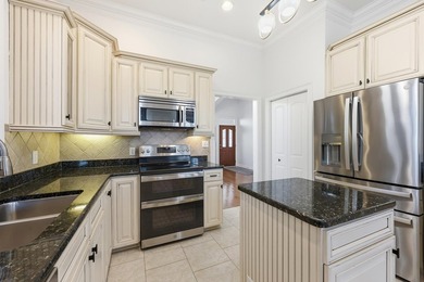Custom built Mediterranean style home located in the gated - photo 11