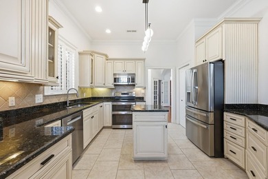 Custom built Mediterranean style home located in the gated - photo 14