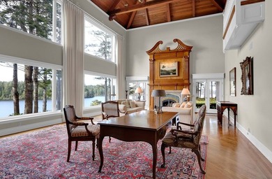 Tucked away on 20.29 lush waterfront acres with 1,358 feet of - photo 23