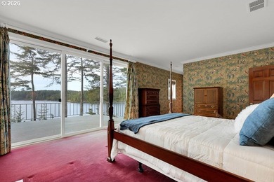 Tucked away on 20.29 lush waterfront acres with 1,358 feet of - photo 33